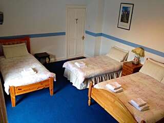 Отели типа «постель и завтрак» Cashel Town B&B Кашел Четырехместный номер-1